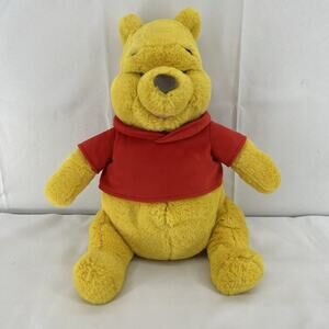 Disney Store "Winnie The Pooh" Bear Stuffed Plush Bear sits 12 Inches tall